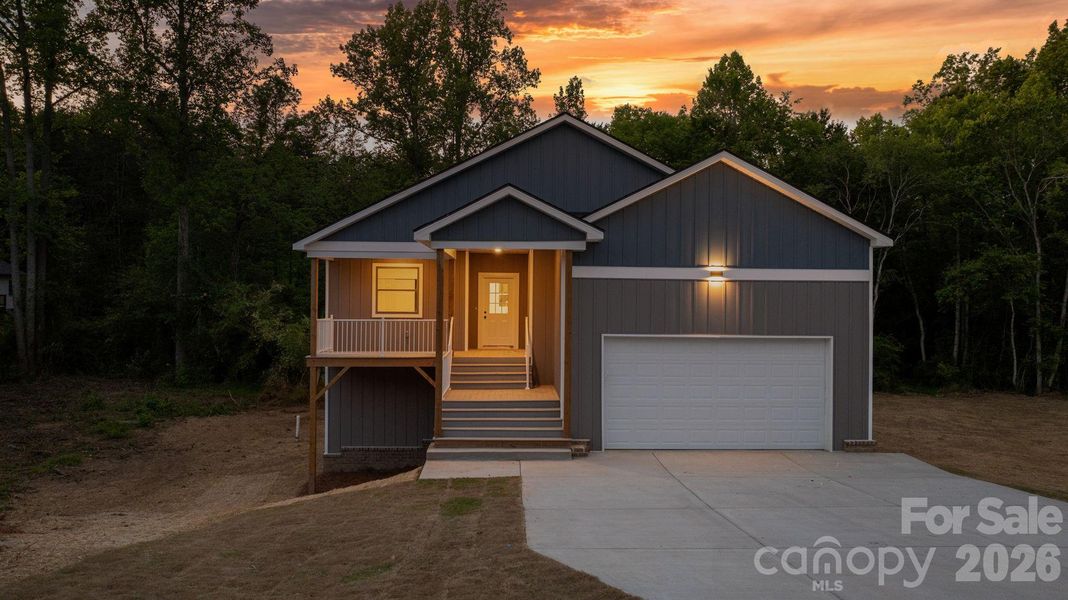 Front exterior of a new home in , Taylorsville, NC, highlighting curb appeal (Image 22).