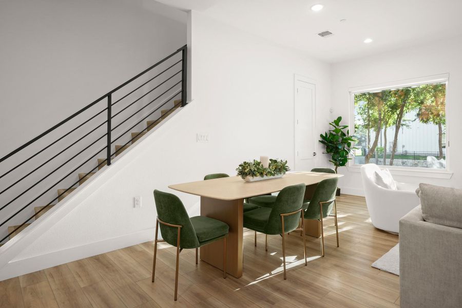 Open floor plan dining with ample space for a sizable dining table. Open floor plan dining with ample space for a sizable dining table.