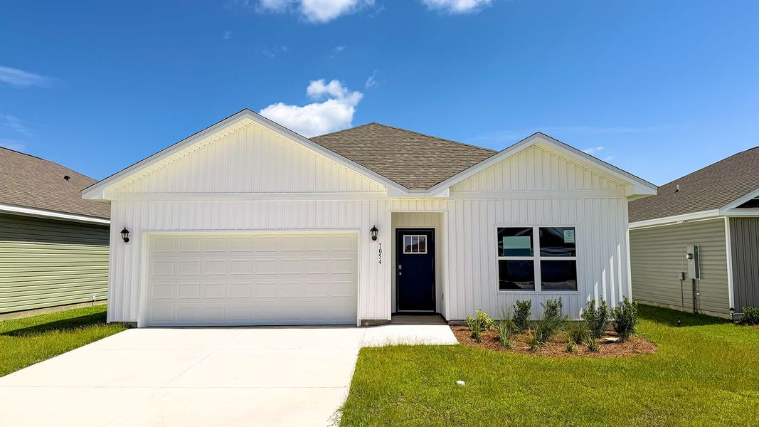 Front exterior of a new home in Liberty, Panama City, FL, highlighting curb appeal (Image 1). Front exterior of a new home in Liberty, Panama City, FL, highlighting curb appeal (Image 1).
