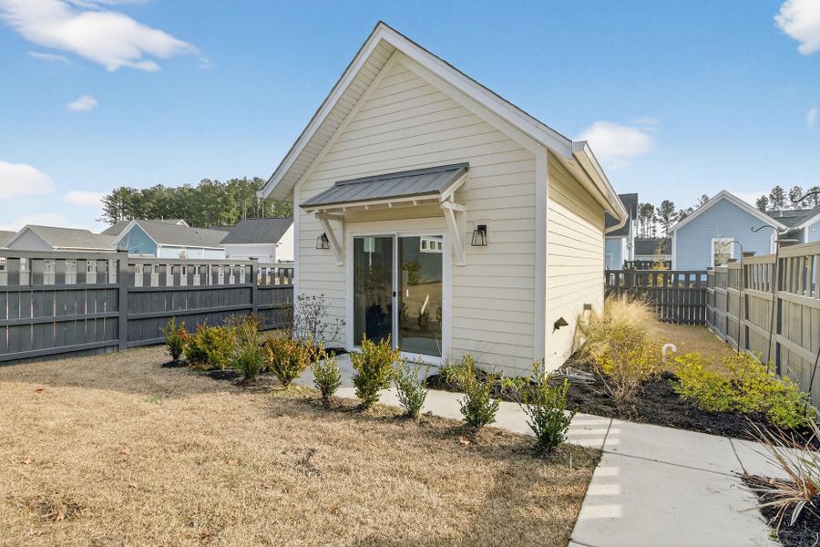 Exterior details and patio area of a home in The Domus Collection at Midtown Nexton, Summerville (Image 36). Exterior details and patio area of a home in The Domus Collection at Midtown Nexton, Summerville (Image 36).