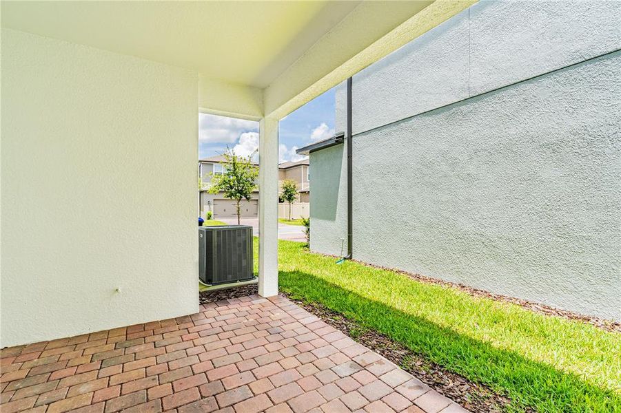 Front exterior of a new home in Encore at Ovation, Winter Garden, FL, highlighting curb appeal (Image 18).