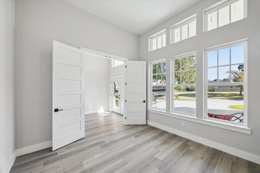 Just inside the Foyer is a welcoming well sun bathed Study. 12 Ft. Ceilings throughout the First Floor.