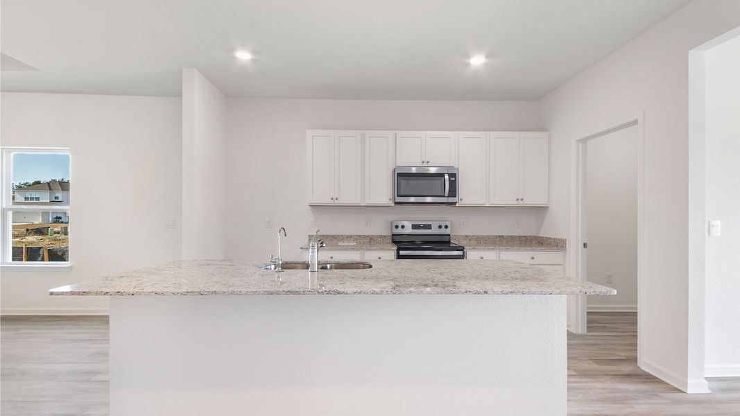 Furnished interior view inside a new home in Owl's Head East, Freeport (Image 9).