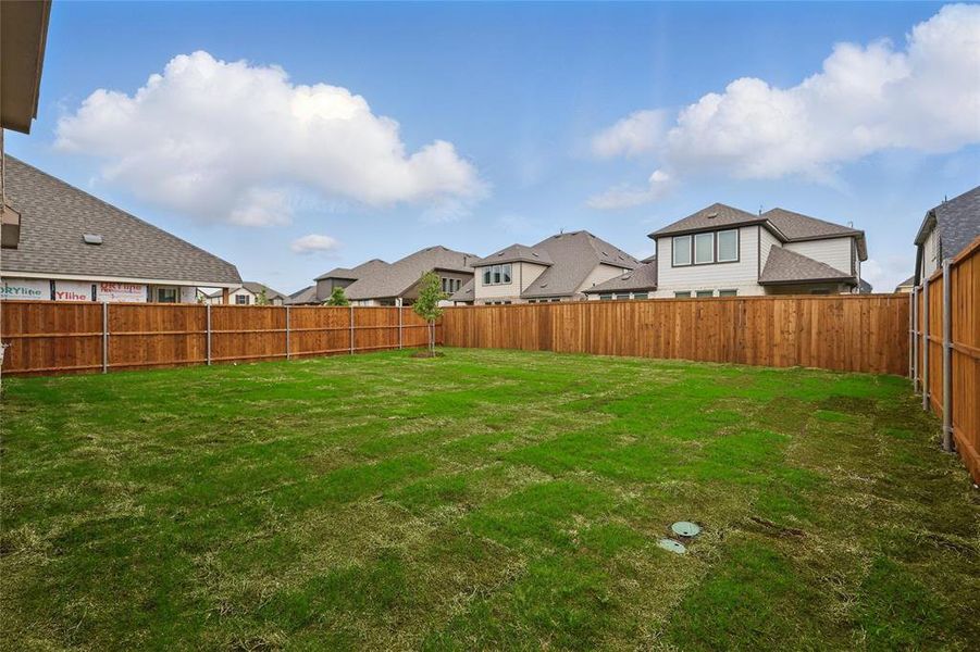 View of yard with a fenced backyard and a residential view View of yard with a fenced backyard and a residential view