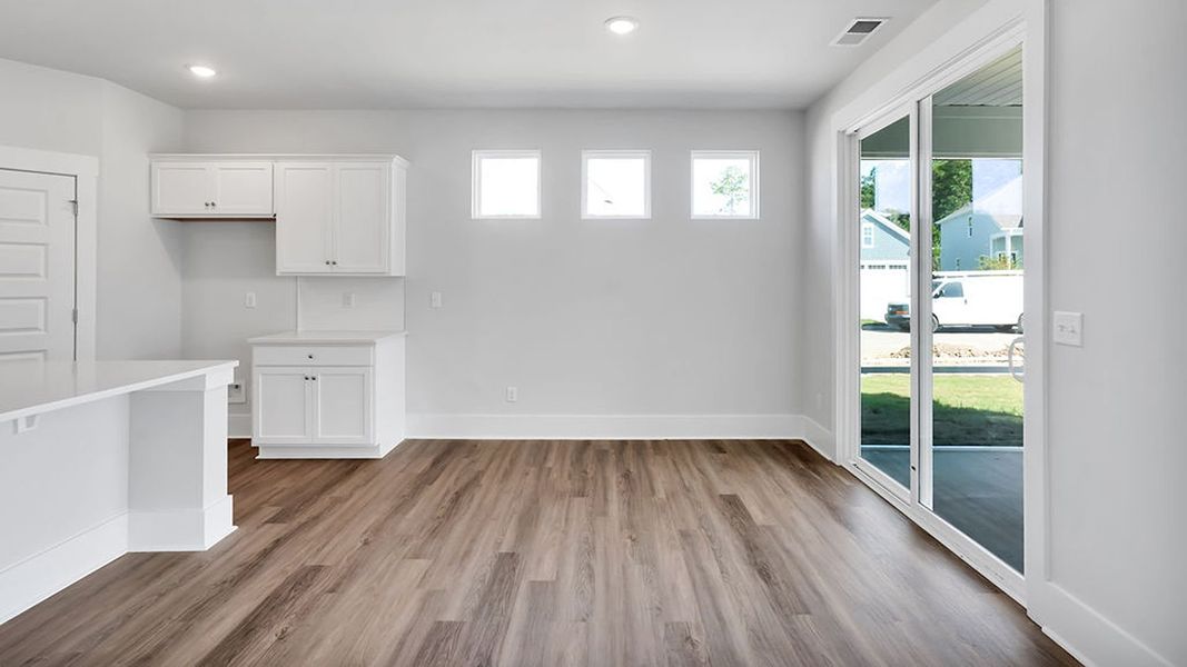 Spacious, unfurnished interior of a new home in The Haven at Indigo Preserve, Leland (Image 13).