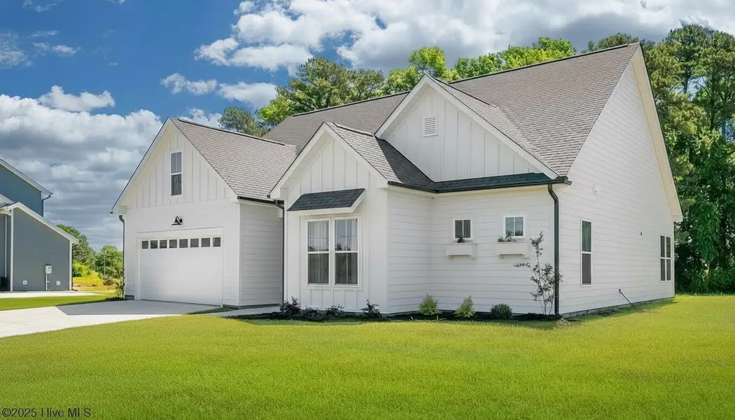 Front exterior of a new home in Country Club Creek, Ayden, NC, highlighting curb appeal (Image 1).