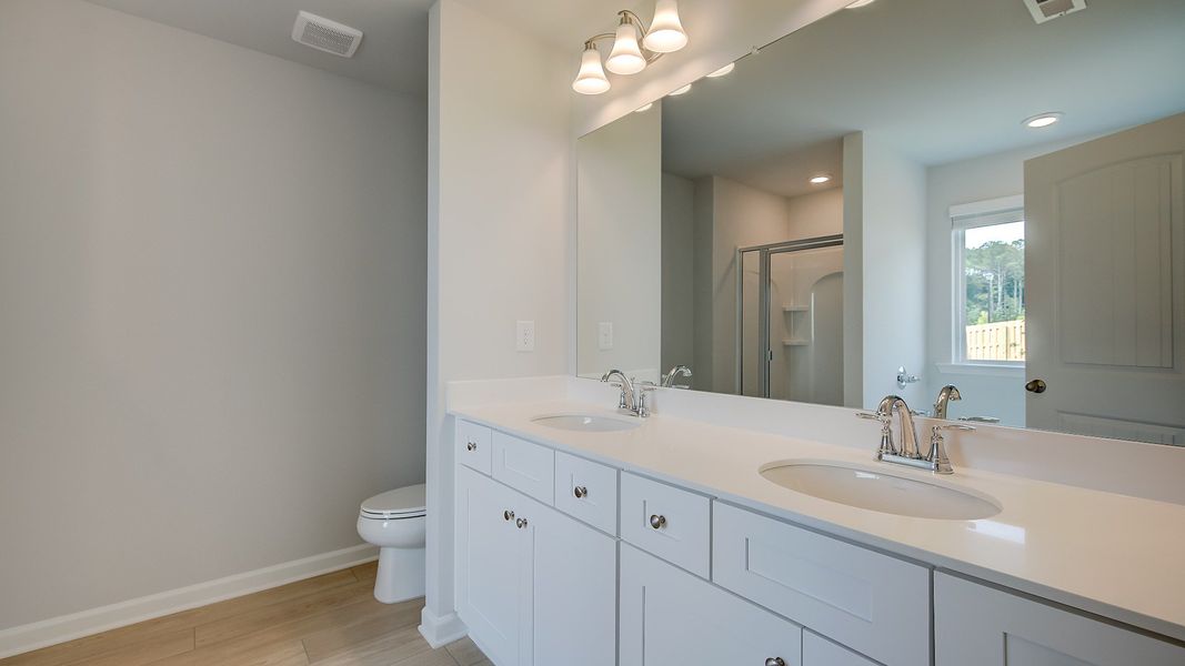 Furnished interior view inside a new home in Bowers Farm Townhomes, McDonough (Image 20).