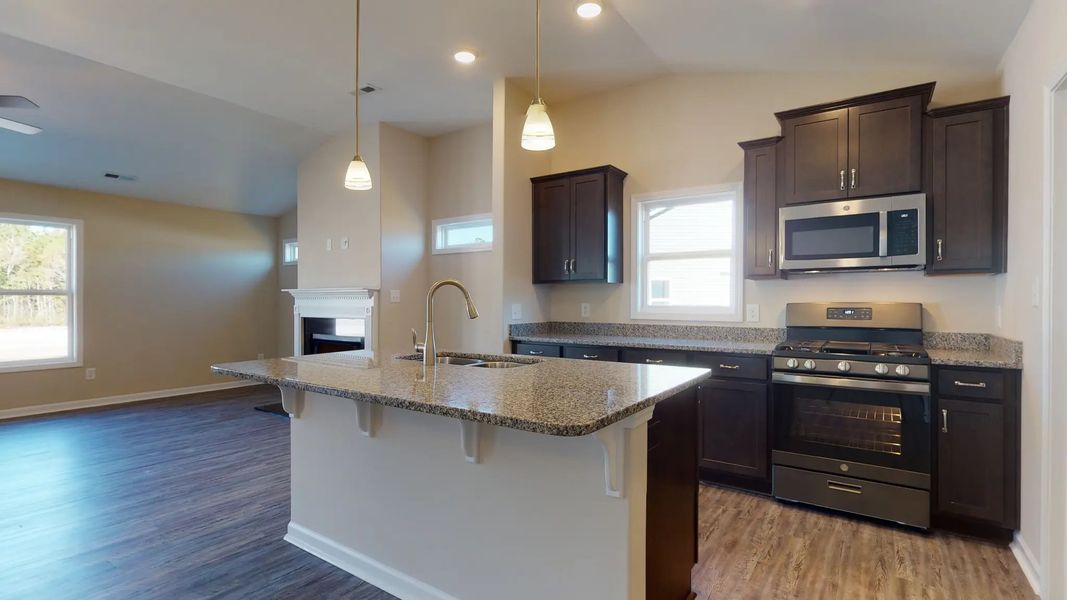 Representative furnished interior of a home built from the Corbin A by JC Jackson Homes,LLC in Heritage Pointe, Newport (Image 6).