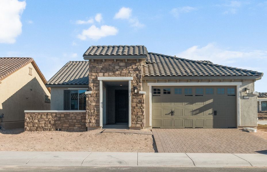 Front exterior of a new home in Sun City Festival, Buckeye, AZ, highlighting curb appeal (Image 19).