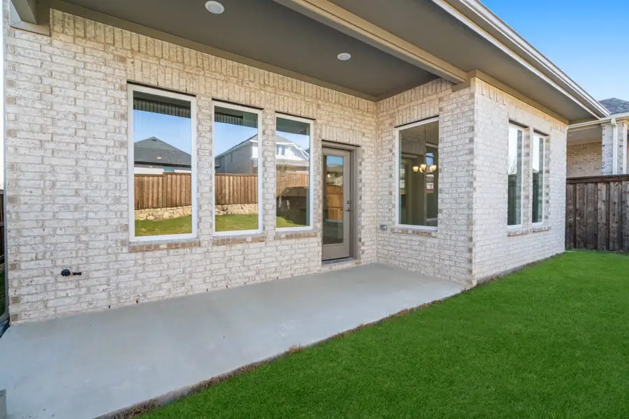 Exterior details and patio area of a home in Reunion, Rhome (Image 23).