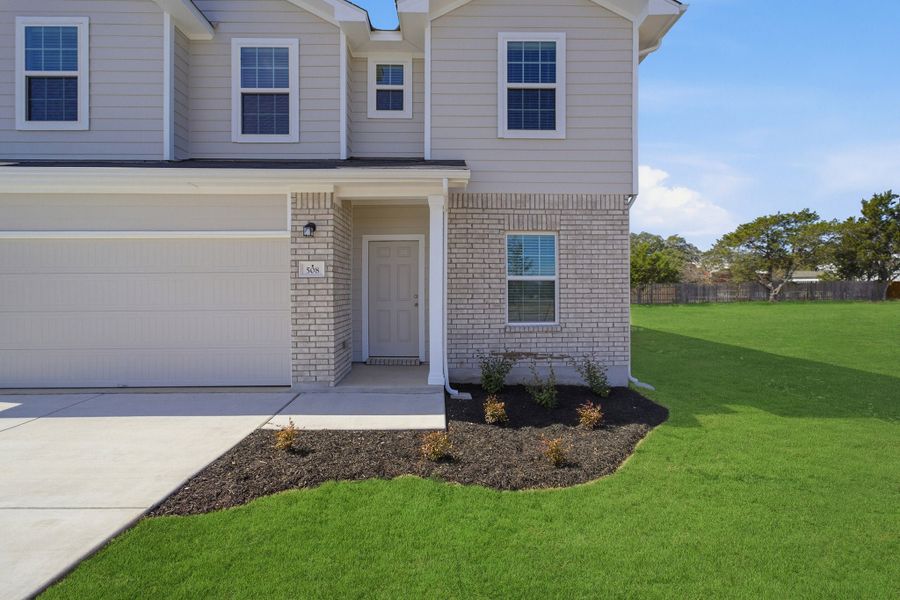Exterior details and patio area of a home in Grande Estates, Bertram (Image 3).
