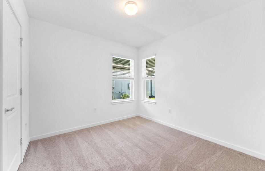 Spacious, unfurnished interior of a new home in Twisted Oaks, Wildwood (Image 17).