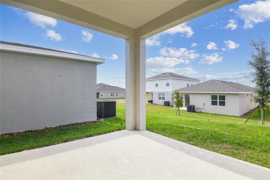 Exterior details and patio area of a home in Seasons at Scenic Terrace, Lake Hamilton (Image 4).