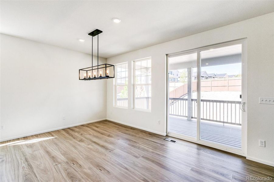 Spacious, unfurnished interior of a new home in Terrain Oak Valley, Castle Rock (Image 35).