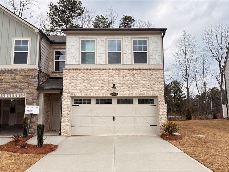 Front exterior of a new home in Leydenview, Mableton, GA, highlighting curb appeal (Image 2). Front exterior of a new home in Leydenview, Mableton, GA, highlighting curb appeal (Image 2).