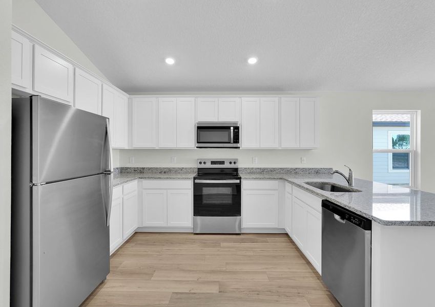 Each kitchen includes stainless steel appliances