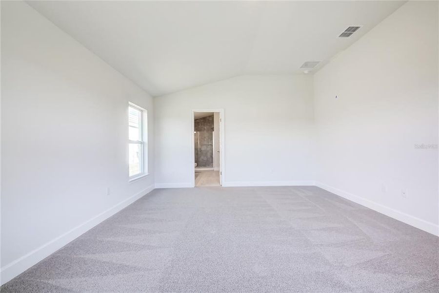 Spacious, unfurnished interior of a new home in Aviary at Rutland Ranch, Parrish (Image 11).