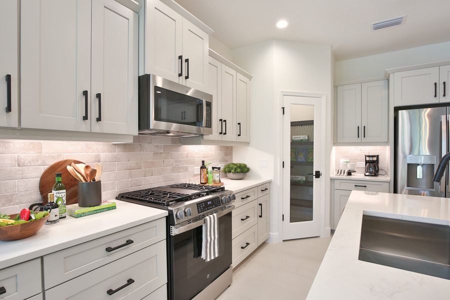 Representative furnished interior of a home built from the Dream 2 by Neal Communities in Boca Royale Golf & Country Club at Wellen Park, Englewood (Image 8).