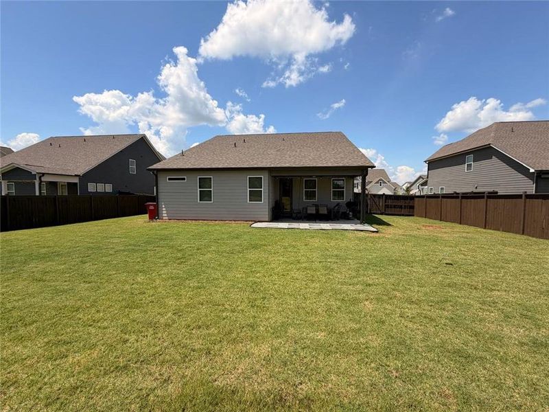 Exterior details and patio area of a home in Wehunt Meadows, Hoschton (Image 4).