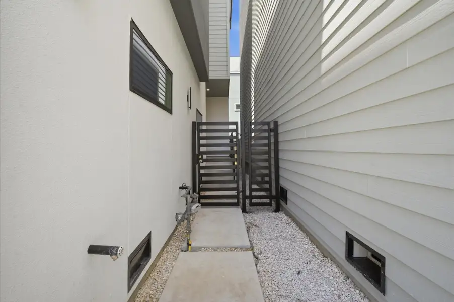 Exterior details and patio area of a home in , Houston (Image 3).