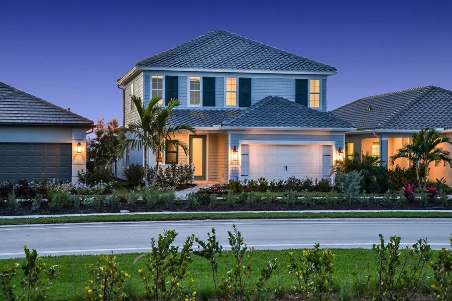 Representative exterior photo of a completed home built from the Heritage by Neal Communities in SkySail, Naples, FL (Image 2).