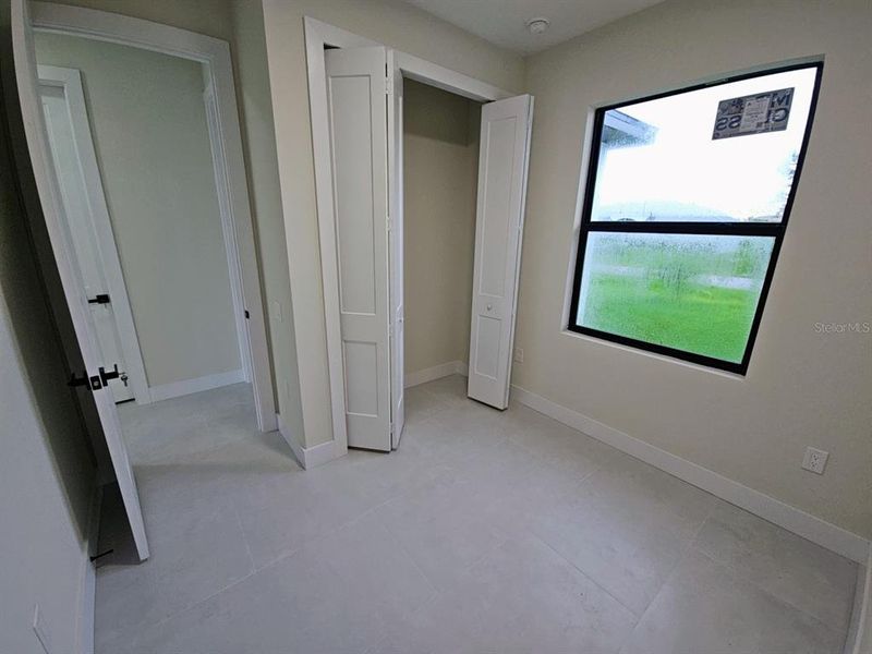 Spacious, unfurnished interior of a new home in , Port Charlotte (Image 41).