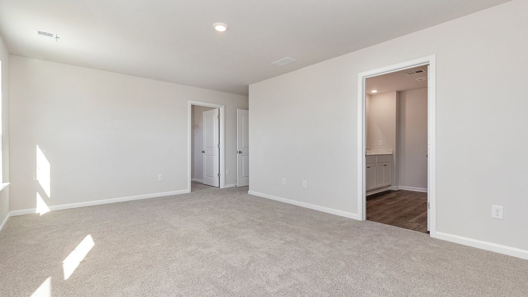 Spacious, unfurnished interior of a new home in The Forest at Black Bear, Longs (Image 7).