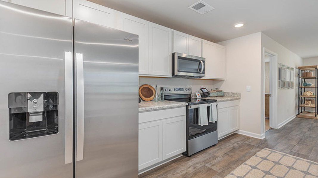 Furnished interior view inside a new home in Cottonwood Place, Tabor City (Image 4).