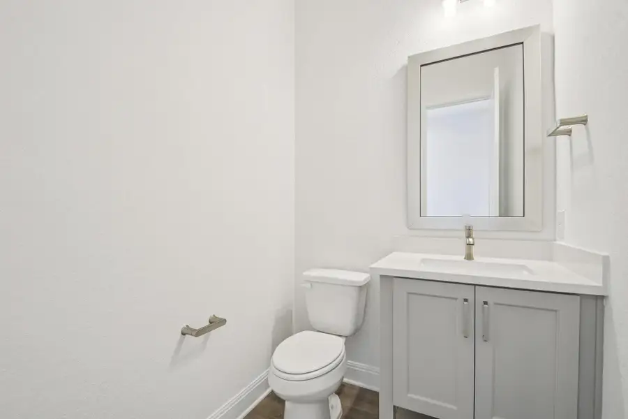Furnished interior view inside a new home in 6 Creeks, Kyle (Image 8).