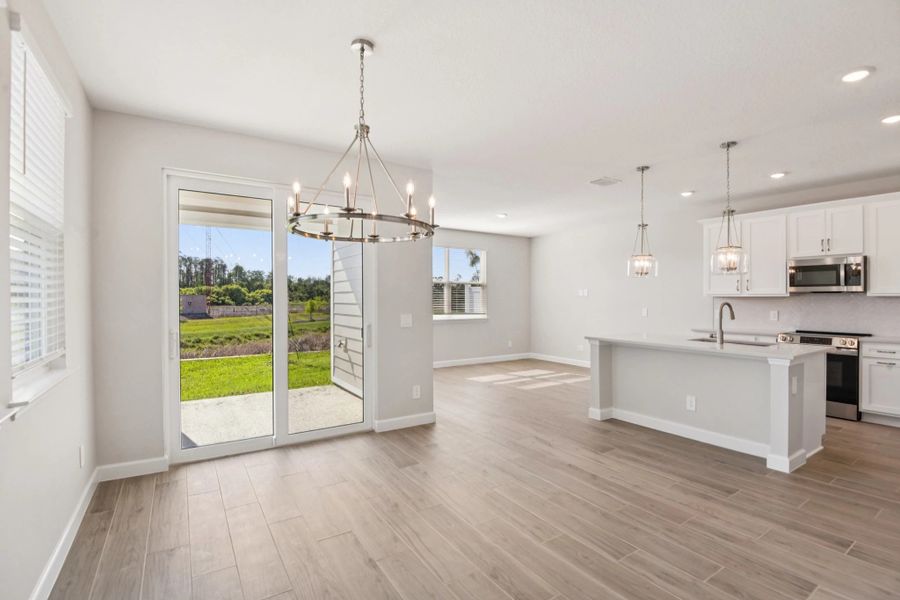 Beautiful dining space which opens up into sliding glass door