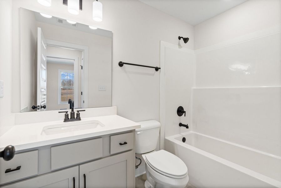 Full bath with vanity and tub / shower combination Full bath with vanity and tub / shower combination