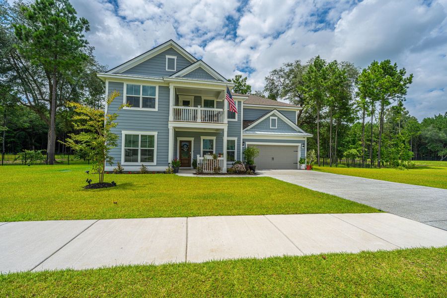 Front exterior of a new home in Sea Island Preserve, Johns Island, SC, highlighting curb appeal (Image 31).