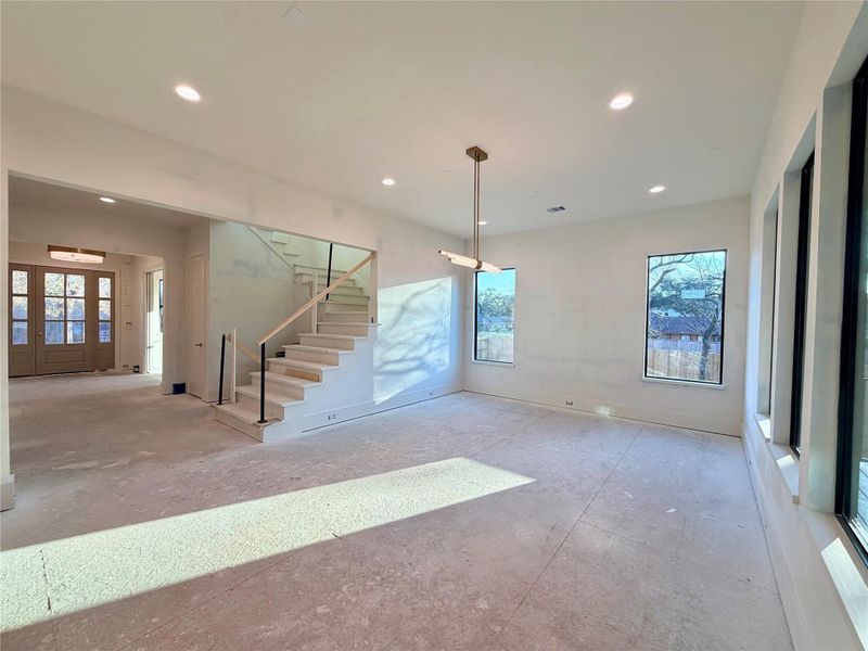 2203 Cheshire - Entry Hall and Dining Room - Construction Status as of 2/13/2026 2203 Cheshire - Entry Hall and Dining Room - Construction Status as of 2/13/2026