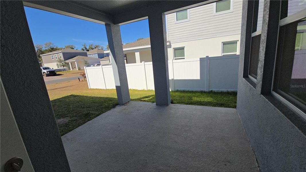 Exterior details and patio area of a home in Rhett's Ridge, Apopka (Image 19).