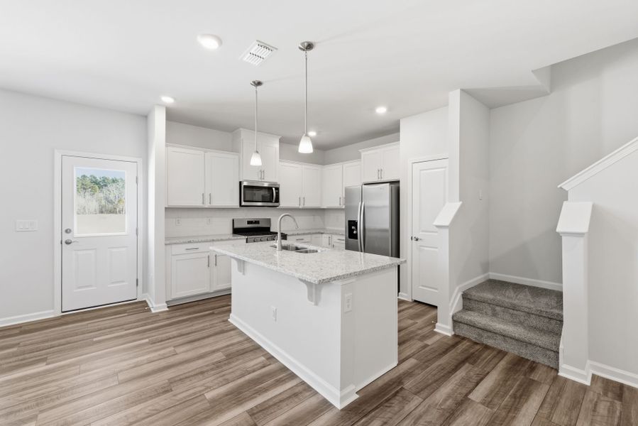 Furnished interior view inside a new home in Poets Walk, Whitsett (Image 11).