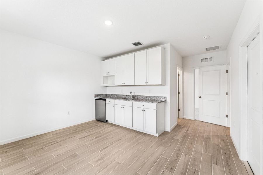 Furnished interior view inside a new home in , Port St. Lucie (Image 15).