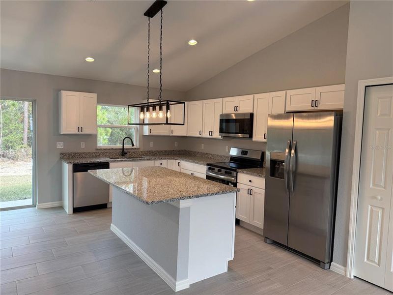 Furnished interior view inside a new home in , Dunnellon (Image 3).