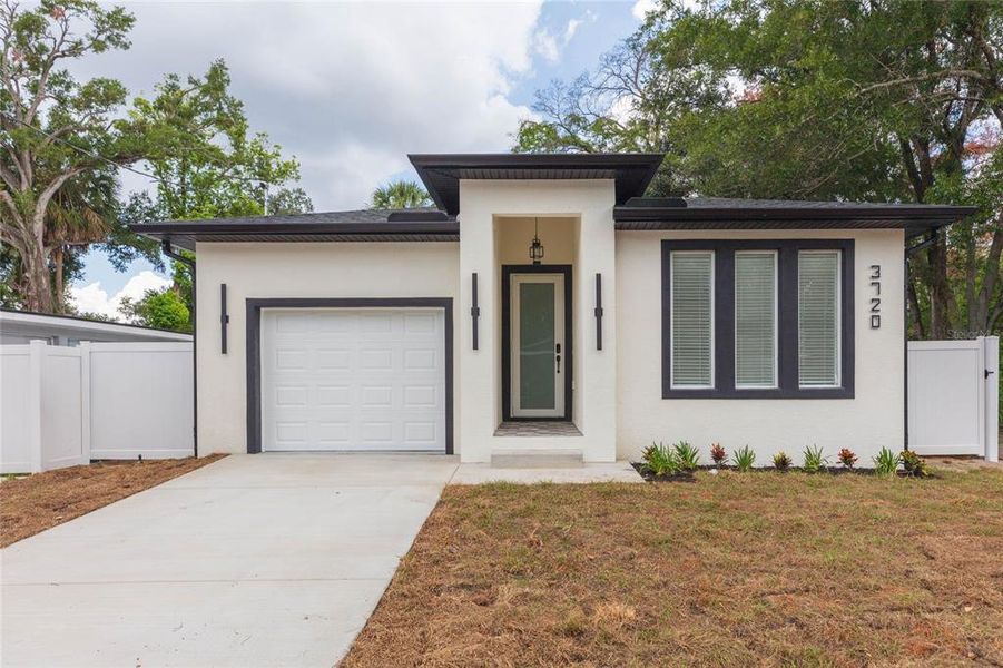 Front exterior of a new home in , Tampa, FL, highlighting curb appeal (Image 2). Front exterior of a new home in , Tampa, FL, highlighting curb appeal (Image 2).