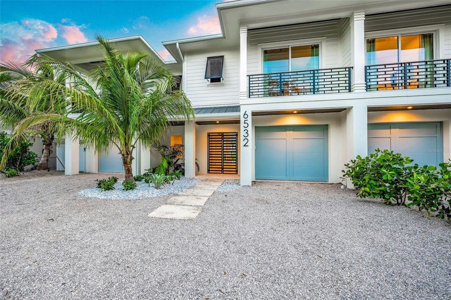 Front exterior of a new home in , Sarasota, FL, highlighting curb appeal (Image 33).