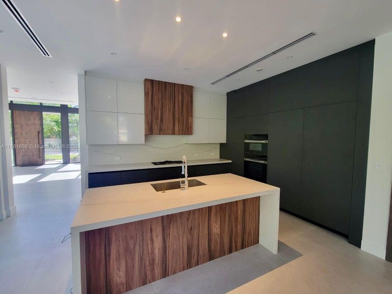 Furnished interior view inside a new home in , South Miami (Image 15). Furnished interior view inside a new home in , South Miami (Image 15).