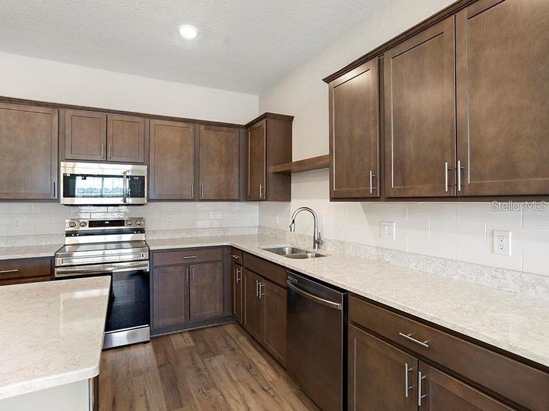 Furnished interior view inside a new home in The Crossings - Townhomes, St. Cloud (Image 11).