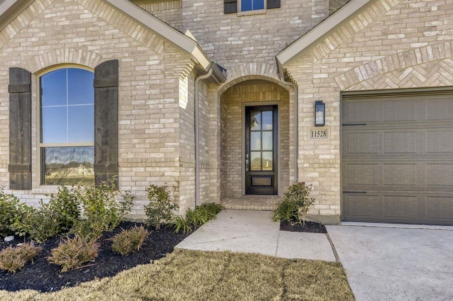 Exterior details and patio area of a home in Wellington, Haslet (Image 18).