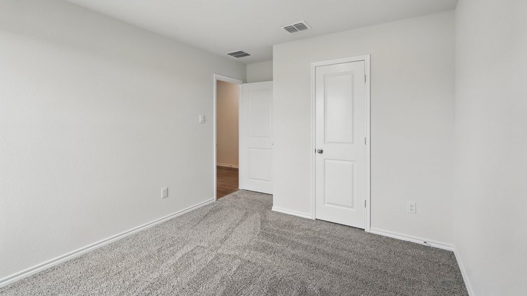 Spacious, unfurnished interior of a new home in Crane Crossing, Crandall (Image 24).