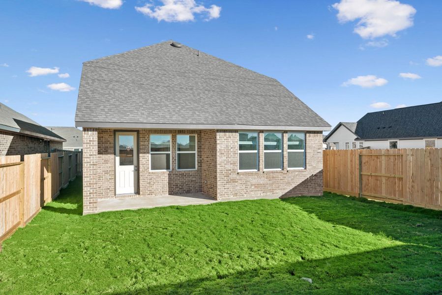 Peaceful backyard with covered patio Peaceful backyard with covered patio