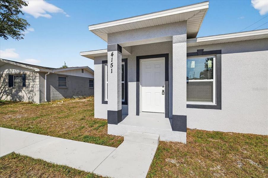 Exterior details and patio area of a home in , Holiday (Image 17). Exterior details and patio area of a home in , Holiday (Image 17).