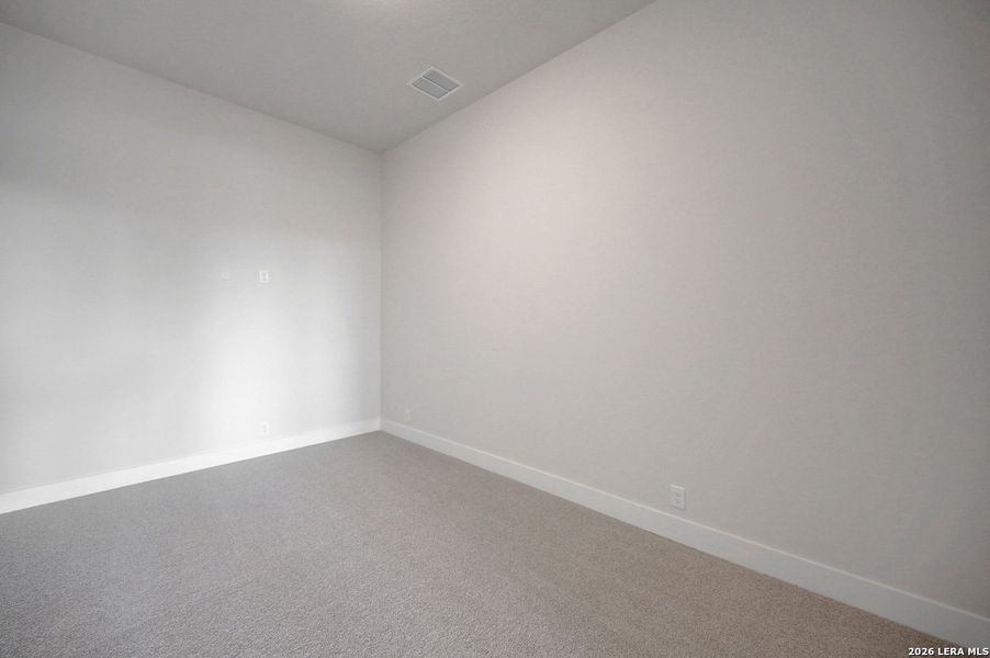 Spacious, unfurnished interior of a new home in Davis Ranch, San Antonio (Image 13).
