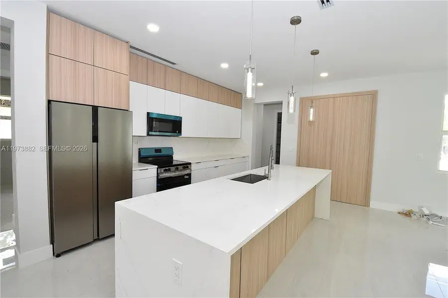 Furnished interior view inside a new home in , Lehigh Acres (Image 7).