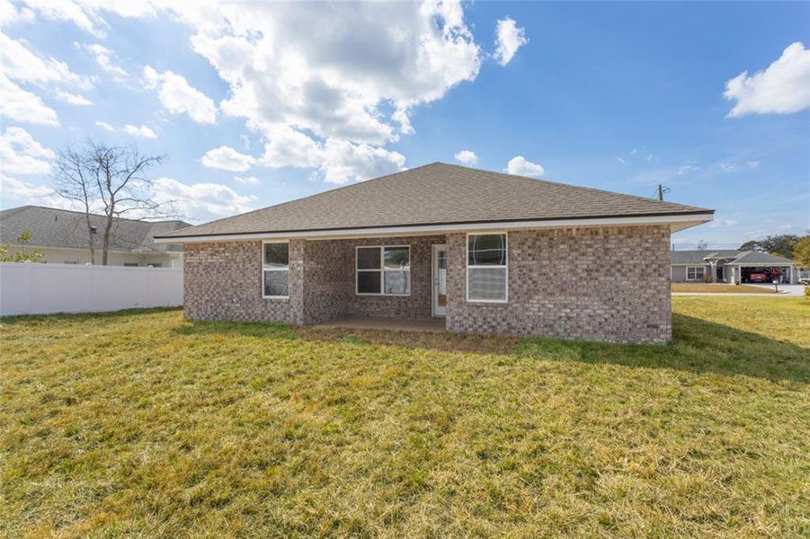 Exterior details and patio area of a home in Palm Coast, Palm Coast (Image 13).