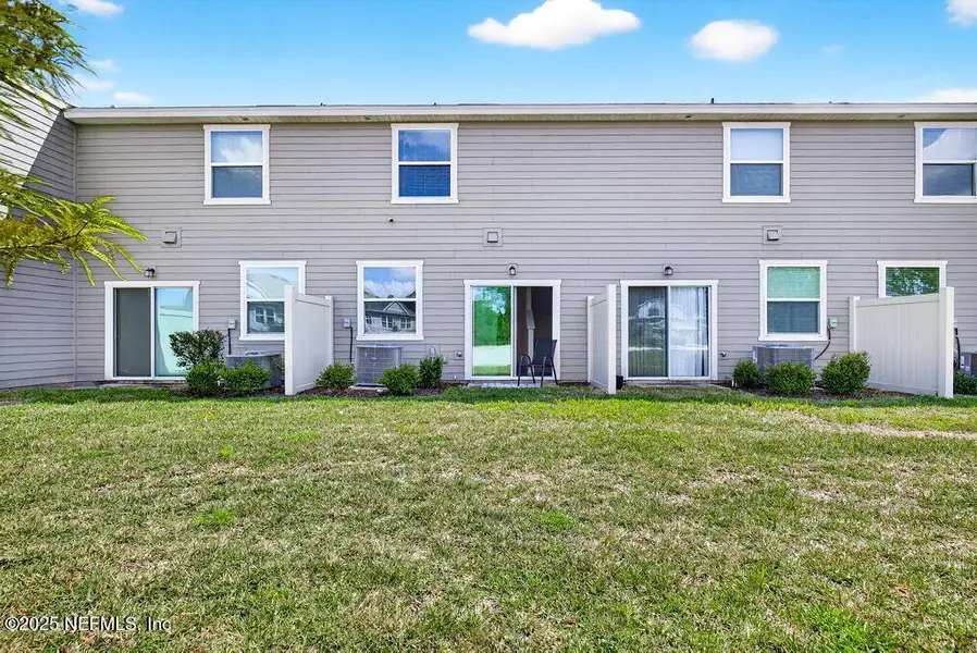 Front exterior of a new home in , Jacksonville, FL, highlighting curb appeal (Image 2).