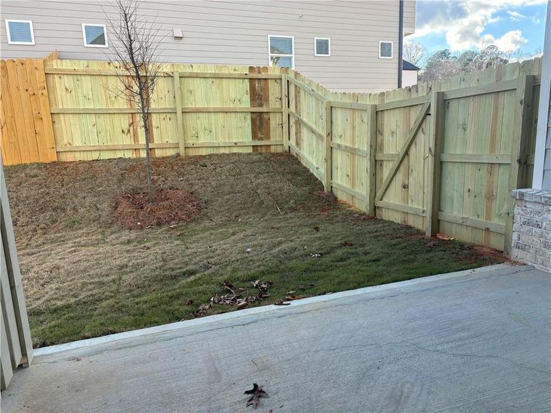 Exterior details and patio area of a home in , Buford (Image 31). Exterior details and patio area of a home in , Buford (Image 31).